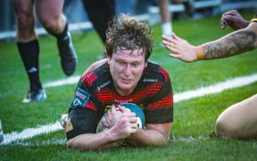 Cullen Grace captain of Canterbury scores a try.
