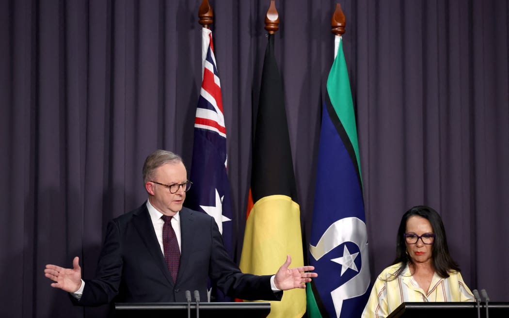 Australia's Prime Minister Anthony Albanese (L) and Minister for Indigenous Australians Linda Burney attend a media conference at Parliament House in Canberra on October 14, 2023.