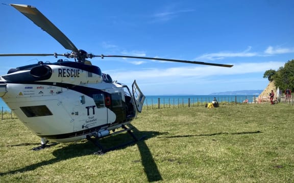 Eastland Rescue Helicopter and search and rescue were called to Tuamotu Island just off Gisborne's Sponge Bay at 9.20am on Tuesday after a small boat capsized, leaving three people in the water about 100 metres off shore.