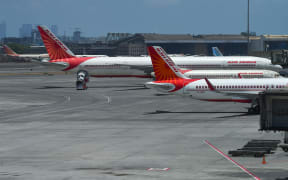 Air India aircrafts are seen parked at the Chhatrapati Shivaji Maharaj International Airport (CSMIA) after domestic flights resumed, in Mumbai on May 28, 2020.