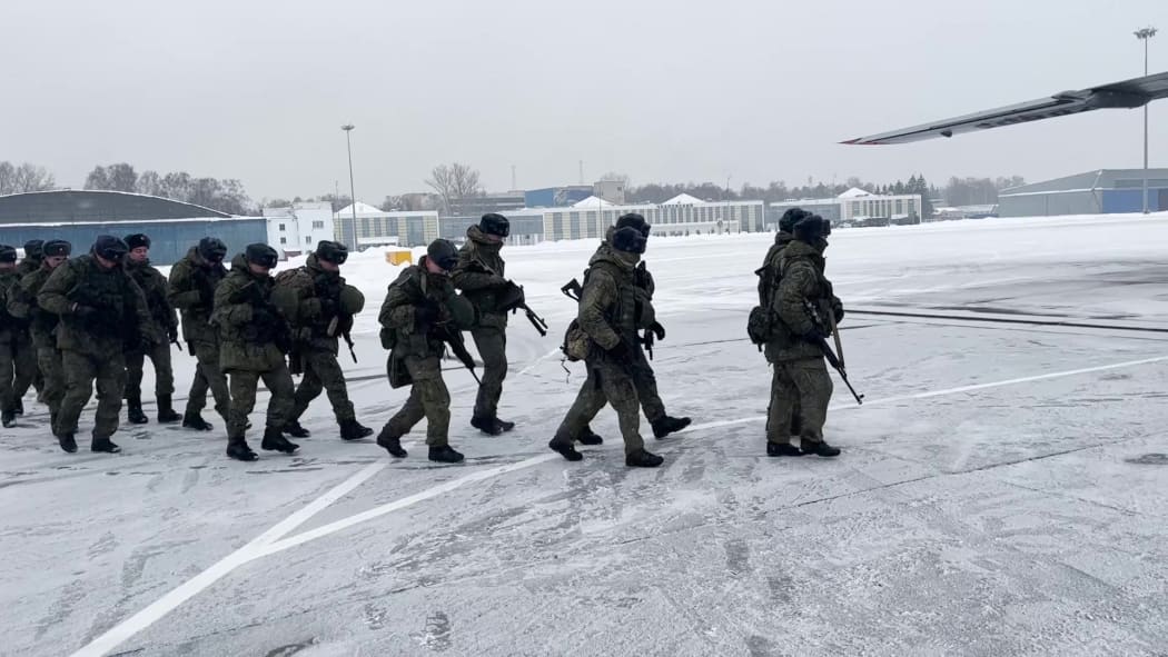 Russian servicemen boarding a military aircraft on their way to Kazakhstan, at an airfield outside Moscow, Russia, on 06 January, 2022.