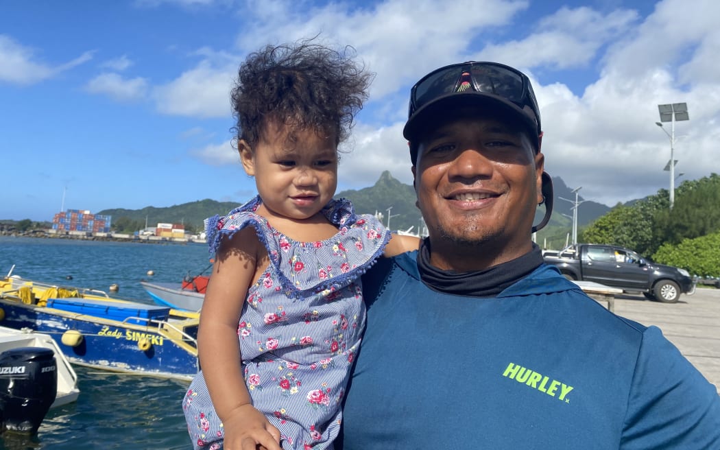 Cook Islands fisherman Michael Tou and his daughter Aki.