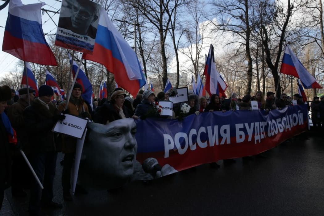 The anniversary of the death of Russian opposition politician Boris Nemtsov is honoured by demonstrators who marched through central Moscow.