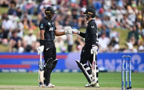 New Zealand's Rachin Ravindra and Mark Chapman during the 2nd one day international cricket match between New Zealand and Sri Lanka.