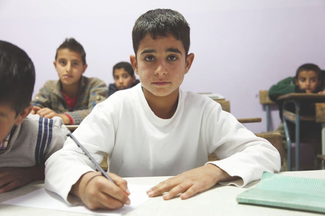 An 11-year old refugee from Syria at school in Lebanon