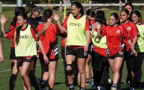 Manukura's first XV girls' team finish an afternoon training session at their Palmerston North school.
