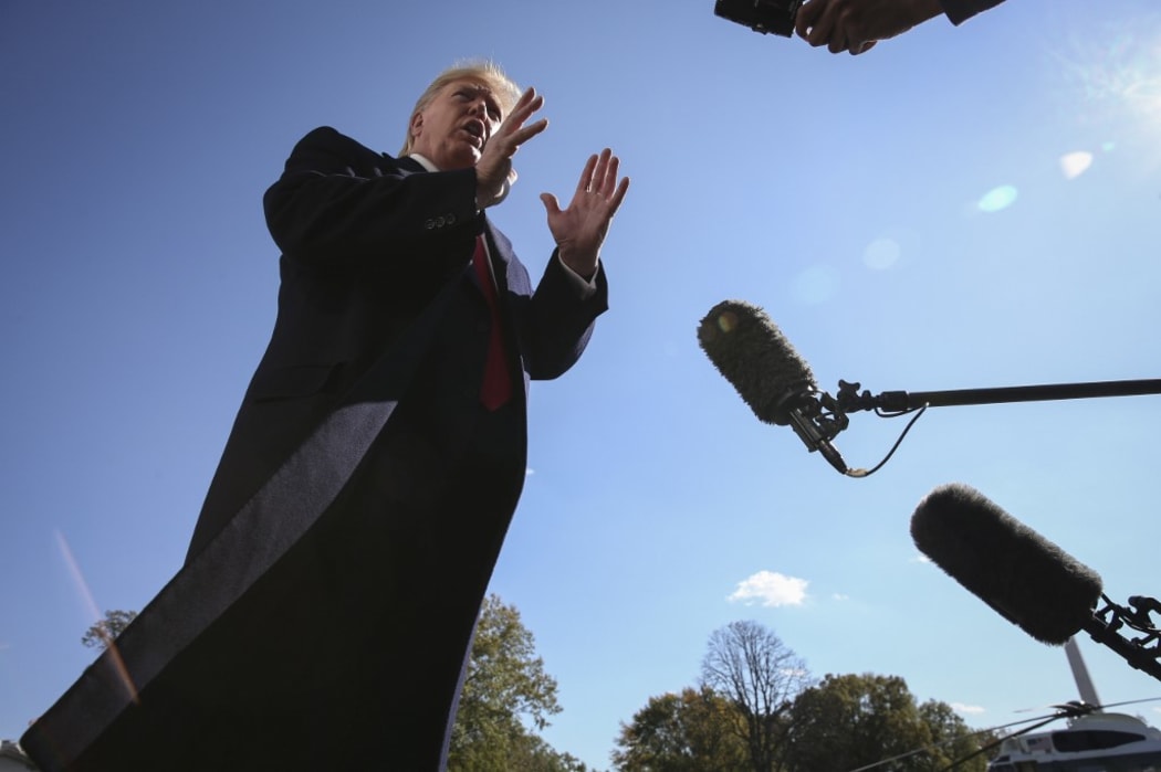 President Donald Trump talks to members of the media on the South Lawn of the White House as he arrives to the White House after a trip to New York on November 3, 2019 in Washington, DC.
(Photo by Oliver Contreras/SIPA USA) | usage worldwide
