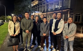 Employment law advocate May Moncur (left) and a group of exploited Chinese migrant workers after the meeting with immigration minister Andrew Little.