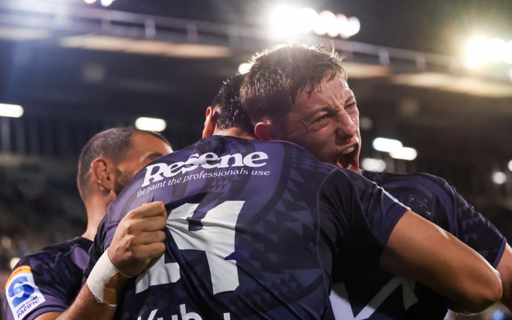 Cam Roigard celebrates with Ngatungane Punivai.