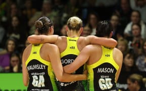 Pulse's Maddy Gordon (C is carried from the caught by team mates Amelia Walmsley (L) and Parris Mason (R after being injured during the ANZ Premiership Wellington Pulse vs Steel netball match at the TSB Arena in Wellington. 28 April 2024. © Copyright image by Marty Melville / www.photosport.nz