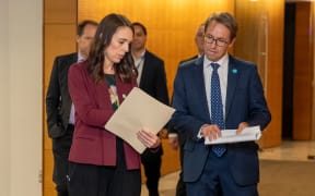 Prime Minister Jacinda Ardern and Director-General of Health Dr Ashley Bloomfield walking to a Covid-19 coronavirus briefing on 6 May, 2020.