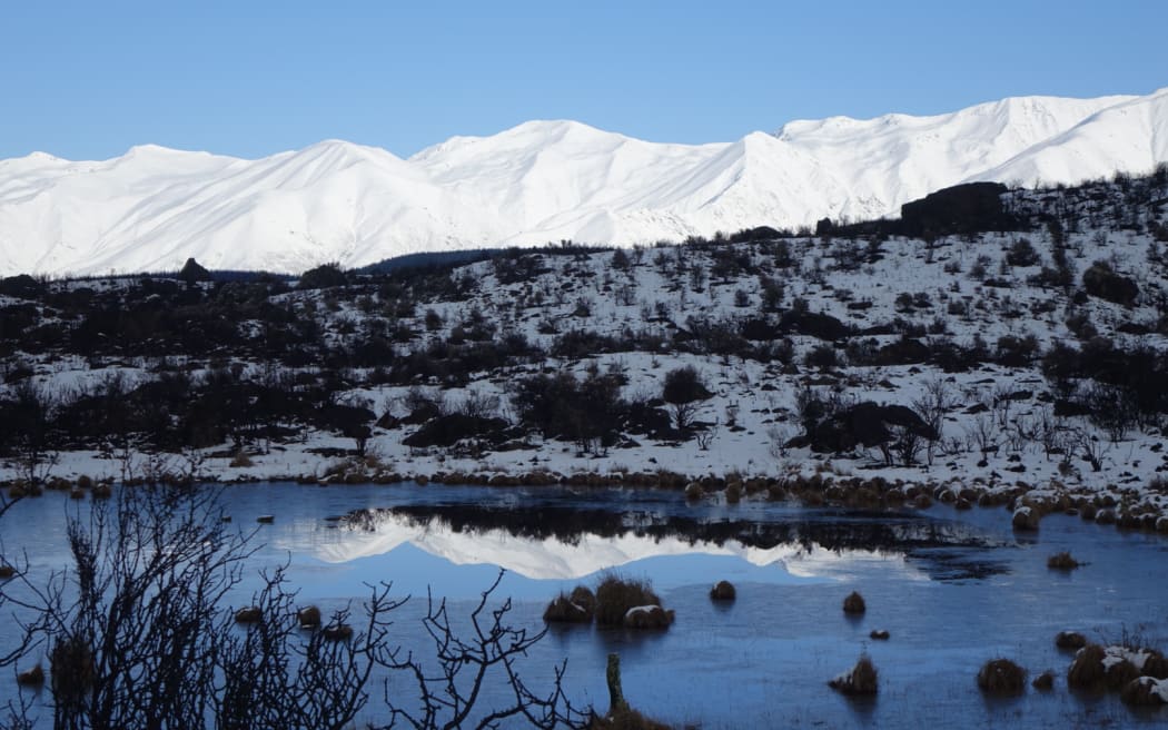The fire near Lake Pukaki near the foot of Aoraki/Mt Cook, in the Mackenzie Country, was contained after snow and heavy rain hit the area but could take months to fully extinguish. 2 September 2020