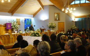 Sione Taumololo and Talita Fifita, who died in a bus crash near Gisborne on Christmas Eve, are remembered at a service at Grey Lynn's Tongan Methodist Church.