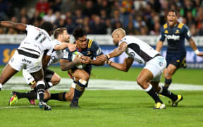 Malakai Fekitoa tries to break the resolute Sharks defence. Photo: Dianne Manson / www.photosport.nz