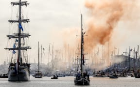 Ships attend the departure of the Sail-in Parade for Amsterdam during the 50th edition of SAIL Amsterdam festival, in IJmuiden, on August 20, 2025. (Photo by Remko de Waal / ANP / AFP) / Netherlands OUT / NETHERLANDS OUT / NETHERLANDS OUT