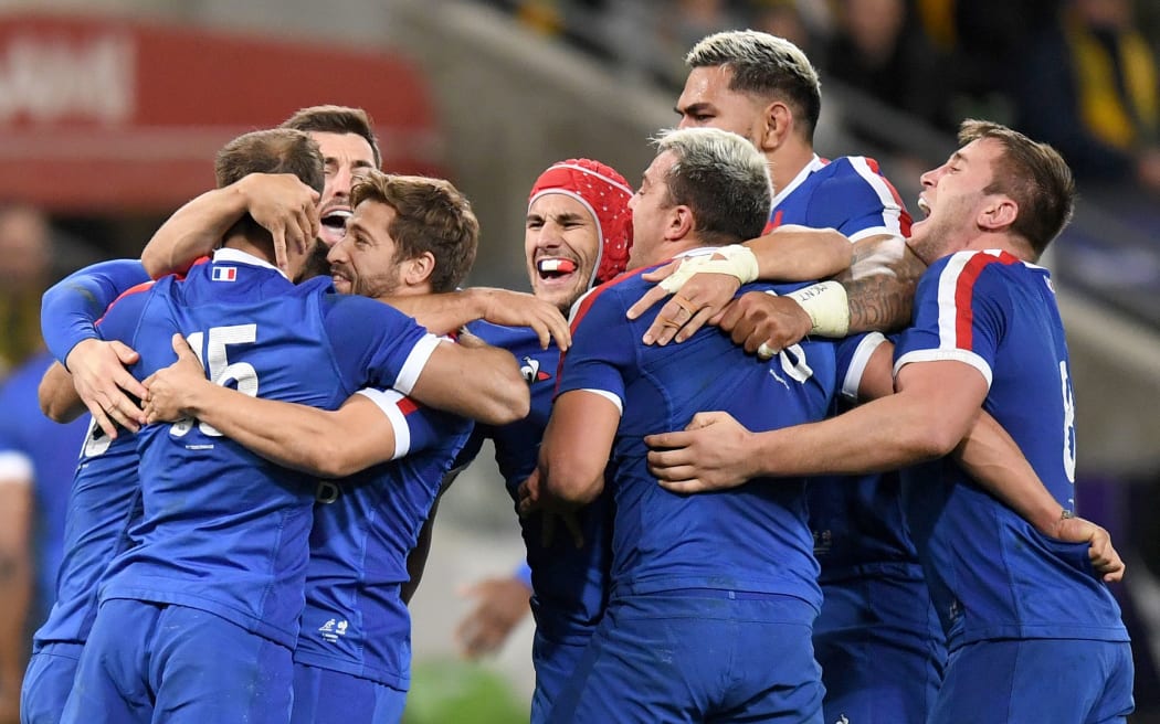 France players celebrate beating Australia 2021.