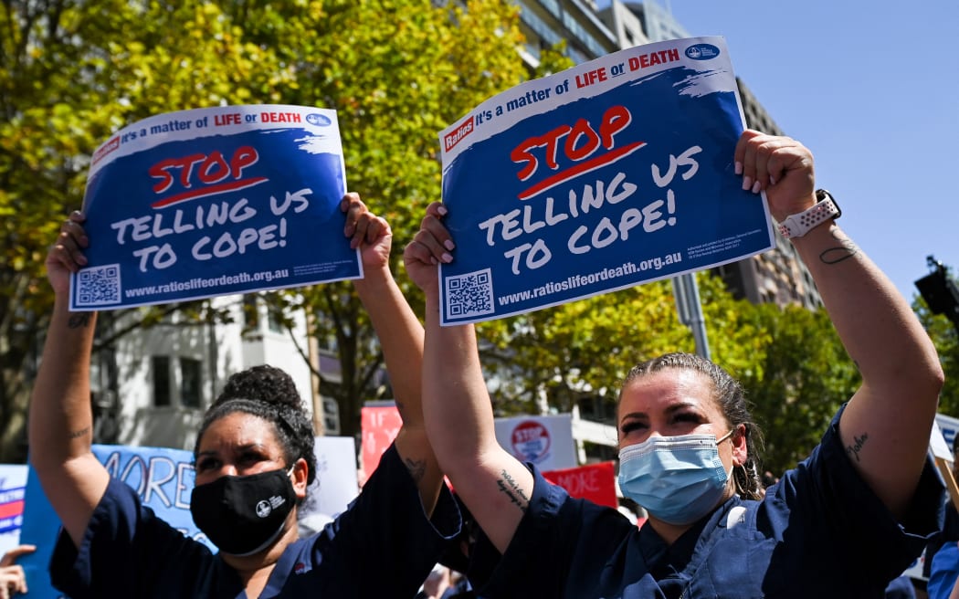 New South Wales public hospital nurses participate in a strike over staff shortages and pandemic-related stresses and strains in Sydney on February 15, 2022.