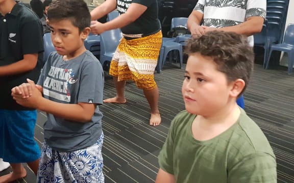 Gedalya Parker, 8, in grey shirt practises the Rotuman tautoga.