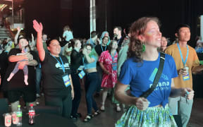 Attendees dance while Anika Moa plays her classic hits.