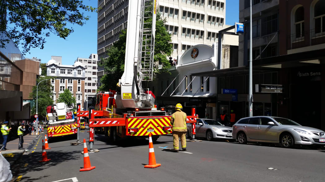 Firefighters douse the blaze at Ibis Hotel in Auckland's Wyndham Street.