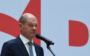 German Finance Minister, Vice-Chancellor and the Social Democrats (SPD) candidate for Chancellor Olaf Scholz delivers a press statement at the party's headquarters in Berlin on September 27, 2021,