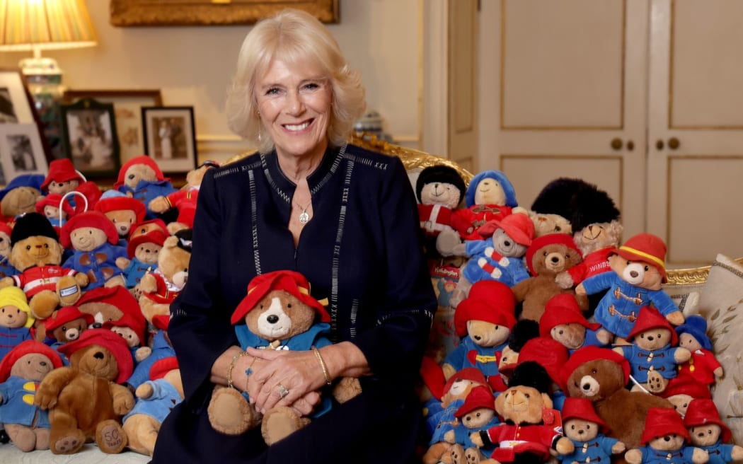 The Queen passed the patronage of Barnardo's to Camilla - who was photographed with some of the bears.