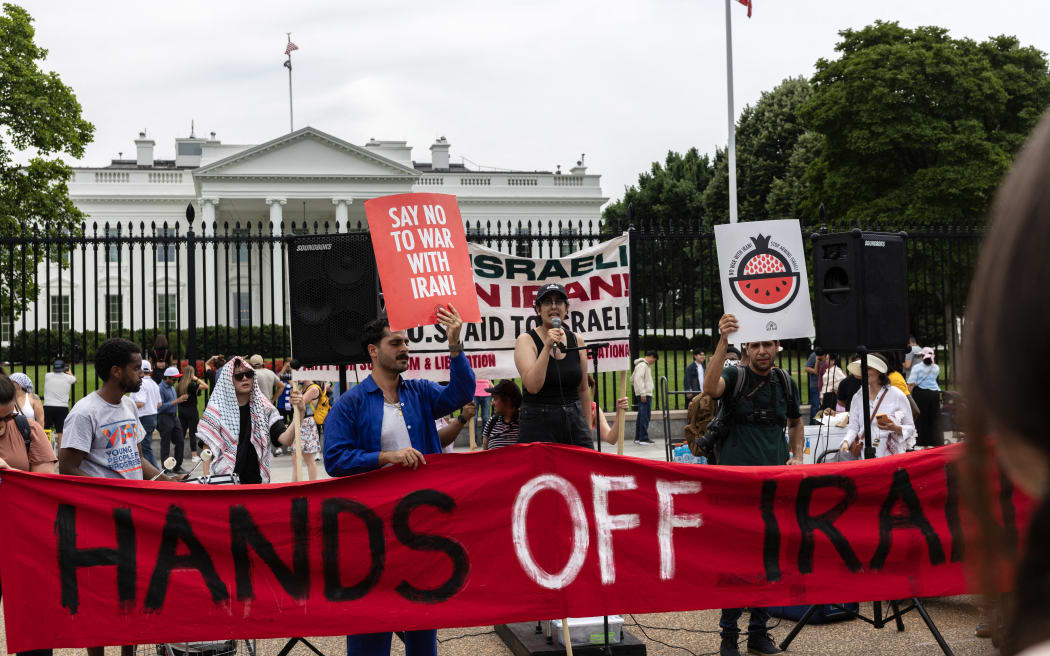 Protesters gather outside the White House in Washington, DC, on June 22, 2025, condemning US airstrikes on Iranian nuclear facilities. Washington claims the strikes cripple Tehran's nuclear program, prompting Iranian threats against US bases in the Middle East. These attacks spark international concern over the escalation of regional tensions following Israel's bombing campaign against Iran in June. (Photo by Probal Rashid/NurPhoto) (Photo by Probal Rashid / NurPhoto via AFP)