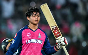 Rajasthan Royals' Vaibhav Suryavanshi, aged 14, celebrates after scoring a century during the Indian Premier League Twenty20 cricket match against Gujarat Titans in Jaipur, 28 April, 2025.