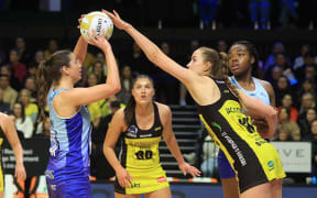 Mystics goal attack Dani Binks, left, lines up a shot under challenge from Pulse captain Kelly Jackson during the ANZ Premiership Grand Final.