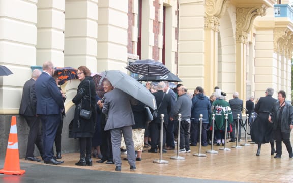 Mourners queued under umbrellas to pay their respects to Sir Tim Shadbolt, whose funeral is getting underway in Invercargill.