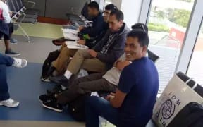 Manus Island refugees waiting at Port Moresby airport.