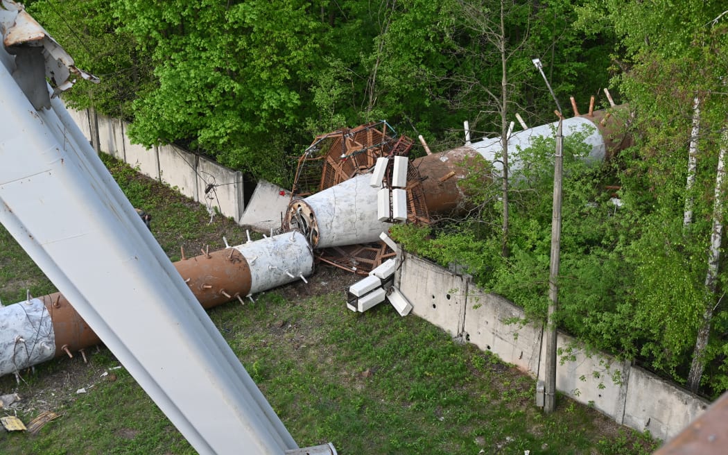 This photograph taken on April 22, 2024 in Kharkiv shows debris from the damaged Kharkiv Television Tower after officials reported a Russian strike on the tower.