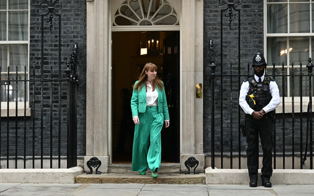Labour Party deputy leader Angela Rayner leaves 10 Downing Street after being named Britain's deputy prime minister in London on July 5, 2024, a day after Britain held a general election. Keir Starmer promised to "rebuild Britain" as he took office as the UK's new prime minister following his centre-left Labour party's landslide general election victory that ended 14 years of Conservative rule. (Photo by Paul ELLIS / AFP)