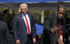 (FILES) Cuba's President Miguel Díaz-Canel arrives for a ceremony at the Fort Tiuna military base during Venezuela's President Nicolas Maduro's inauguration in Caracas on January 10, 2025. Cuba's president made a rare admission Saturday that people enduring food shortages and blackouts in his country were unhappy but he condemned overnight violence in an attack on a Communist Party office. (Photo by JUAN BARRETO / AFP)