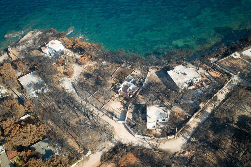 Mati, Athens - July 26, 2018: Aerial view shows a burnt area following a wildfire in the village of Mati, near Athens.