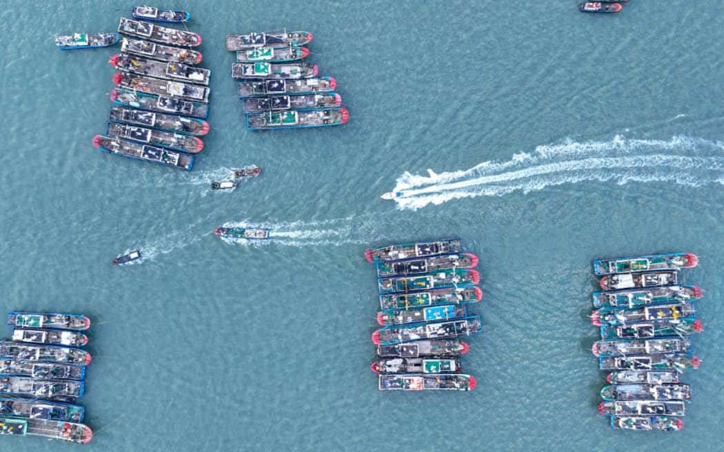 Fishing boats take shelter from Typhoon Severe Tropical Storm Bebinca at Shenjiamen Fishing Port in Zhoushan, China, on September 13, 2024. (Photo by Costfoto/NurPhoto) (Photo by CFOTO / NurPhoto / NurPhoto via AFP)