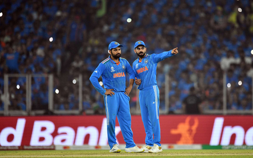 India's Rohit Sharma and Virat Kohli directing the fielders during the ICC Cricket World Cup 2023 Finals match between India and Australia at the Sardar Vallabhbhai Patel Sports Enclave, Gujarat Cricket Association Stadium in Ahmedabad, Gujarat, India. Sunday, 19 November 2023.