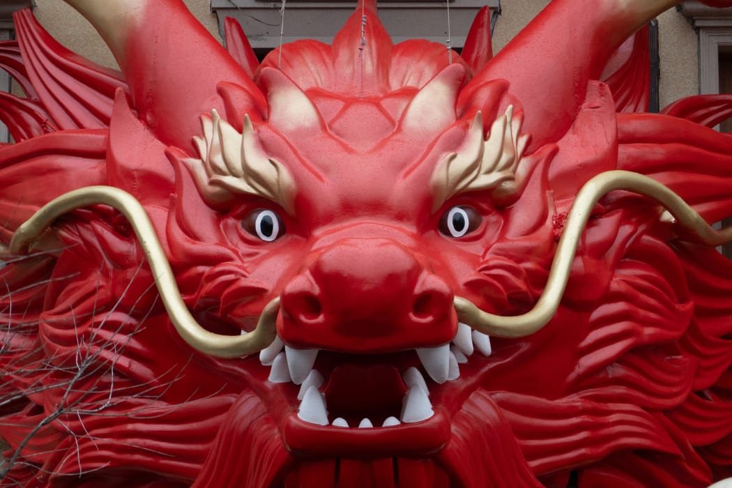 A sculpture installation is being decorated with the theme of the Chinese Year of the Dragon in Shanghai, China, on January 31, 2024. (Photo by Costfoto/NurPhoto) (Photo by CFOTO / NurPhoto / NurPhoto via AFP)