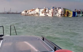 A capsized livestock transport vessel, in the "Midia" Black See harbour near Constanta on November 24, 2019.
