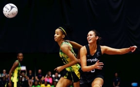 Jamaican defender Shamera Stirling (L) playing in the 2018 Taini Jamison Trophy Series against the Silver Ferns
