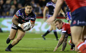 Isaac Luke of the Warriors takes on the Roosters during the NZ Warriors v Roosters at Mt Smart Stadium, on Sunday, 19 June 2016