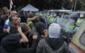 Protesters clash with police on day 23 of the occupation.
