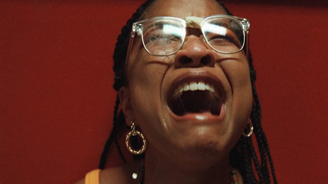 Movie still from the 2023 horror film The Angry Black Girl and Her Monster