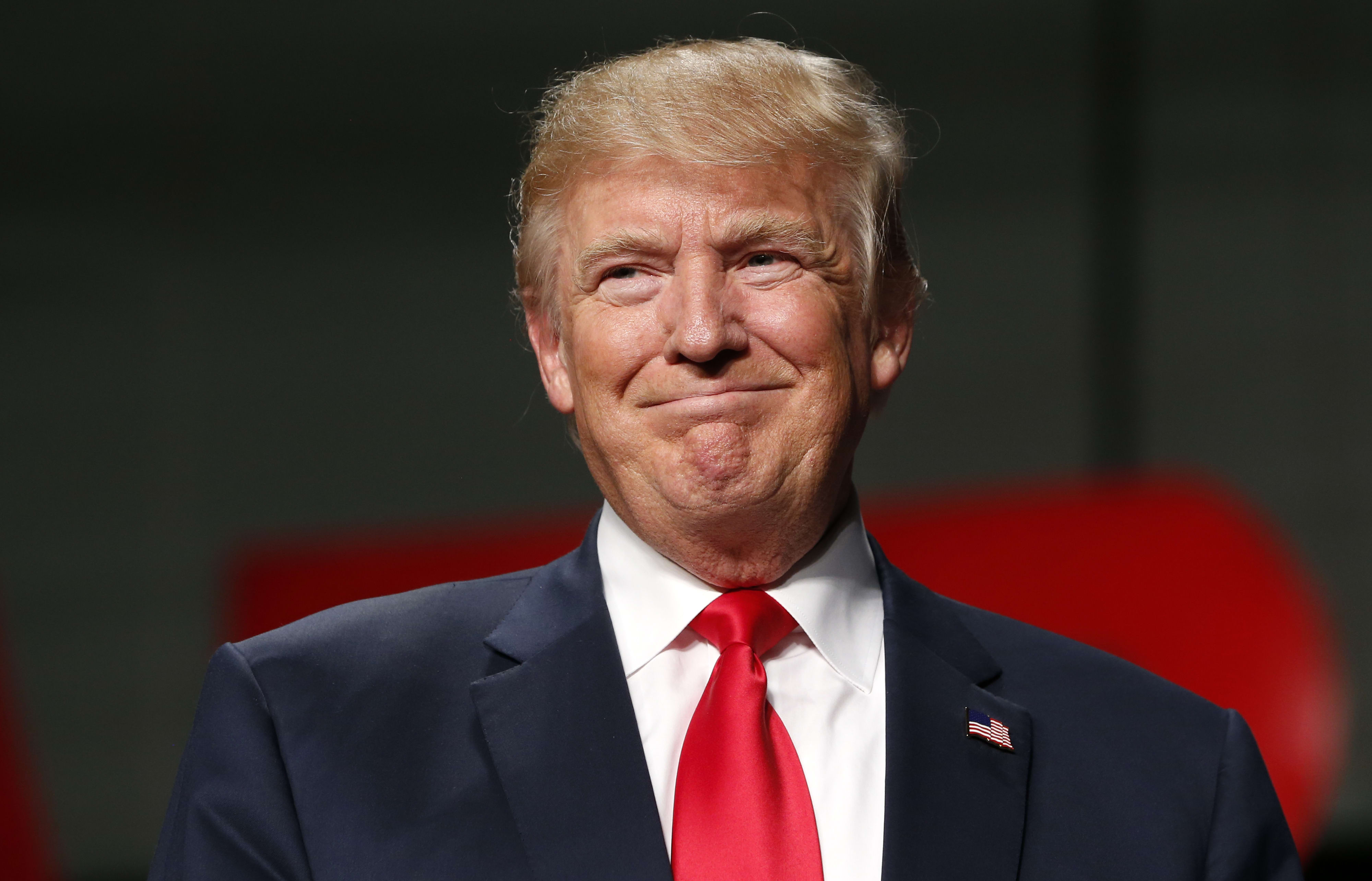US Republican Presidential nominee Donald Trump addresses supporters at Macomb Community College on October 31, 2016 in Warren, Michigan.