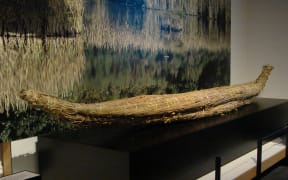 A model of a mōkihi, or reed waka, on display at Toitū Otago Settlers Museum.