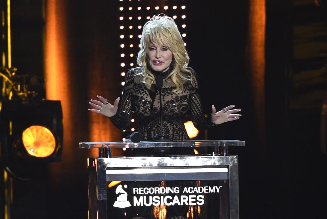 Dolly Parton accepts her award at MusiCares Person of the Year on Friday, Feb. 8, 2019, at the Los Angeles Convention Center.