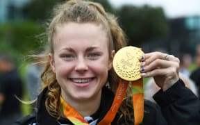 Anna Grimaldi shows her gold medal.
Public Welcome Home Ceremony for the New Zealand Paralympic team at AUT Millenium, Auckland. 23 September 2016.
Copyright photo: Andrew Cornaga / www.photosport.nz