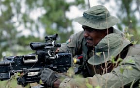 New Zealand Army and Republic of Fiji Military Forces personnel work together in the Nausori Highlands during Exercise Cartwheel 23.