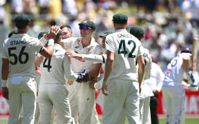 Australia celebrate an England wicket during the third Ashes test in Adelaide.
