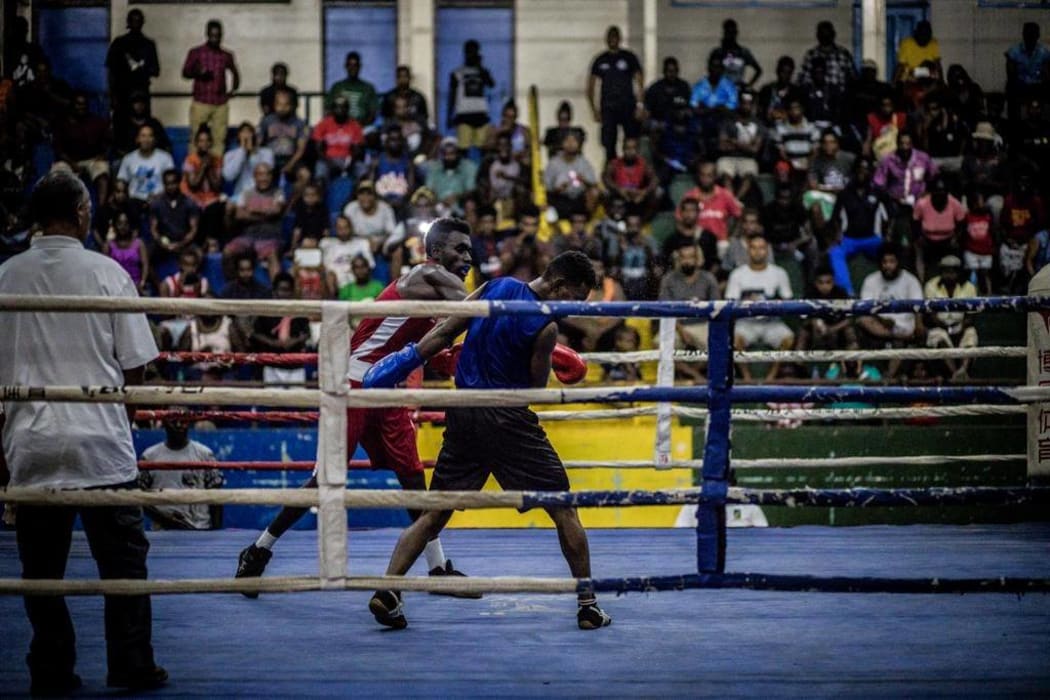 An amateur boxing match at the multi-purpose hall in Honiara.